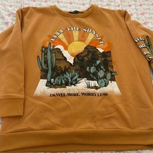 Size XL super cute sweatshirt. Worn once. Item is sold as is in good condition.